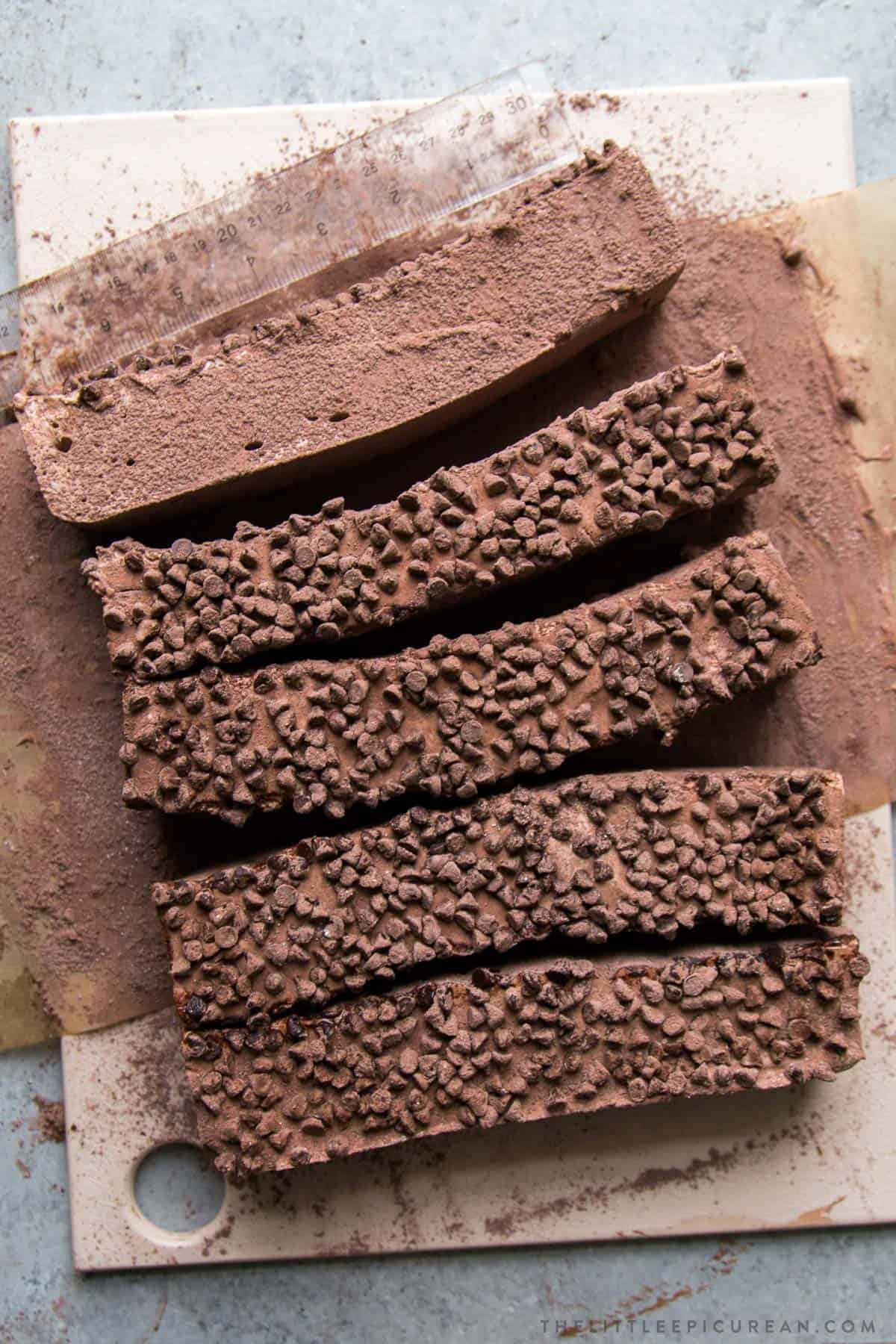 slice chocolate marshmallows and coat generously with cocoa sugar mixture to prevent sticking.