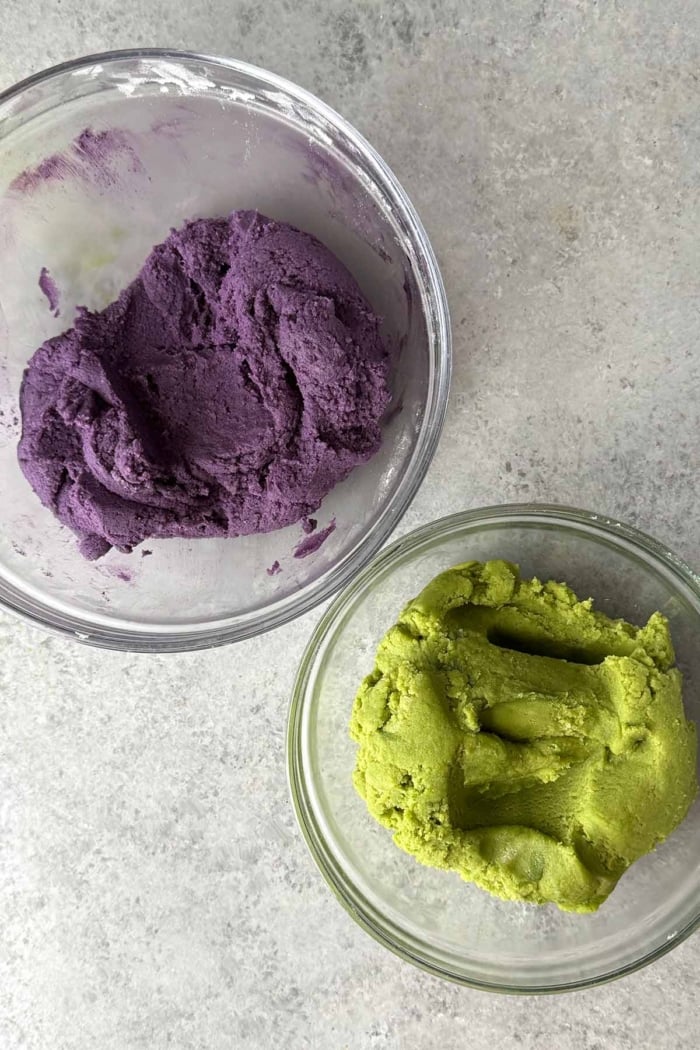 bowl of ube cookie dough and matcha cookie dough.