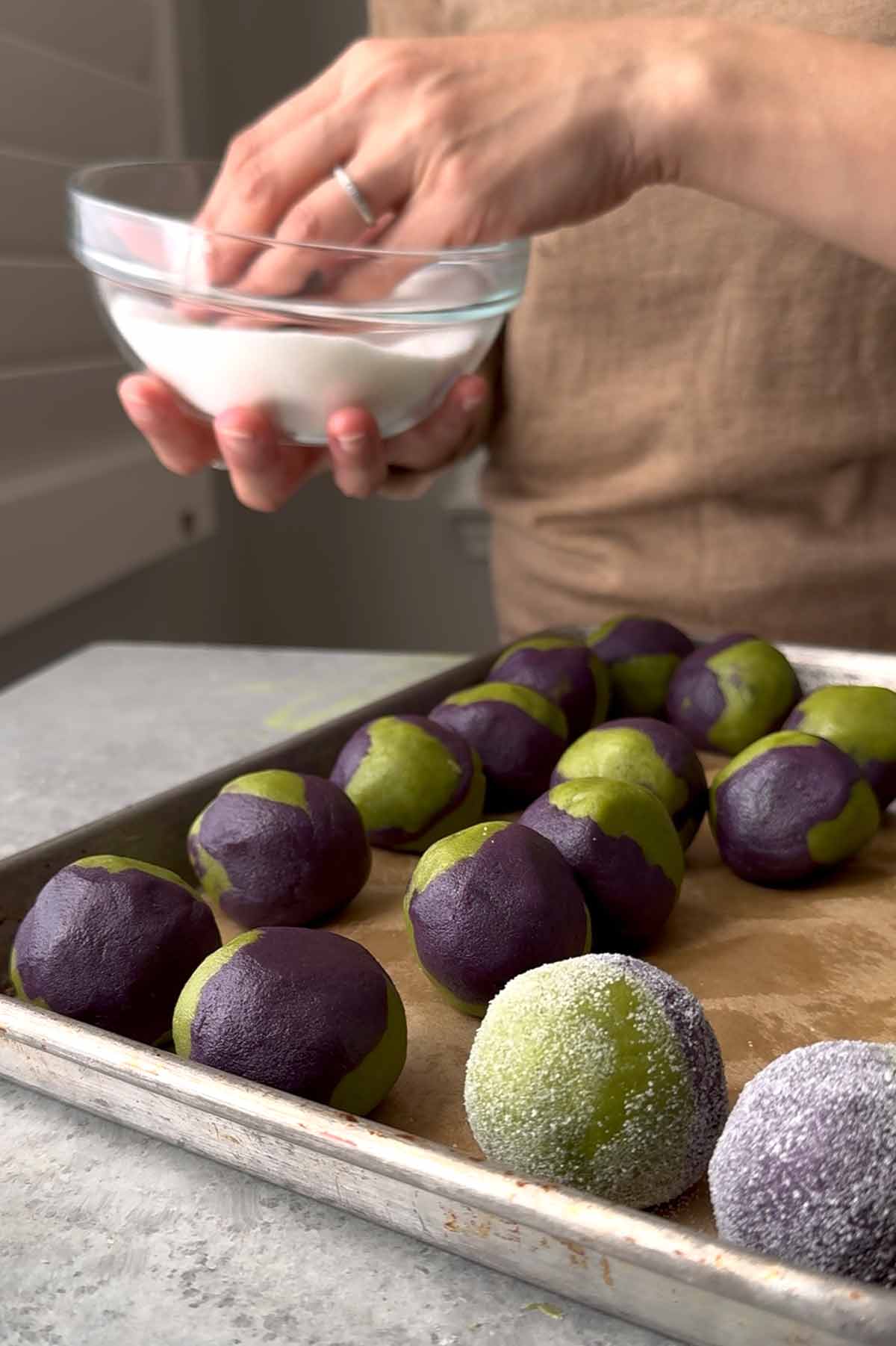 roll cookie dough in sugar before baking. 