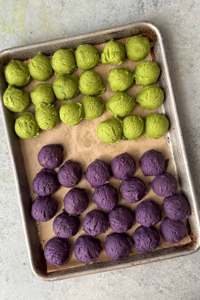 portion out matcha dough and ube dough.