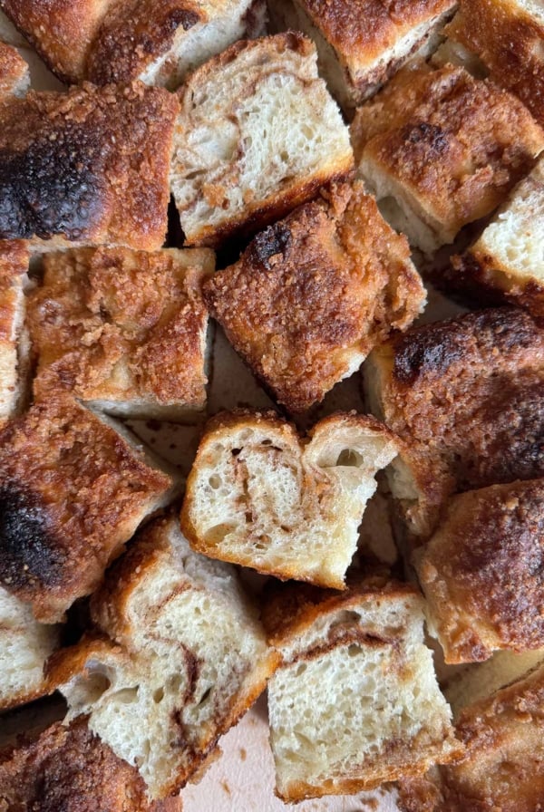 sliced servings of cinnamon roll focaccia bread.