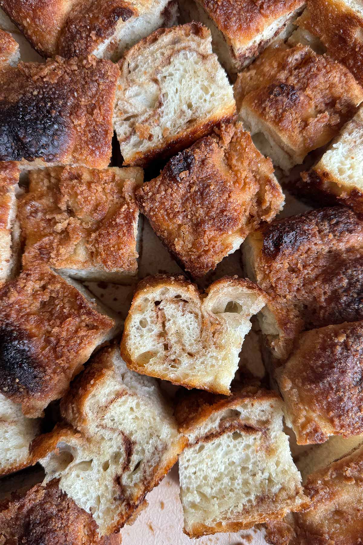 sliced servings of cinnamon roll focaccia bread.