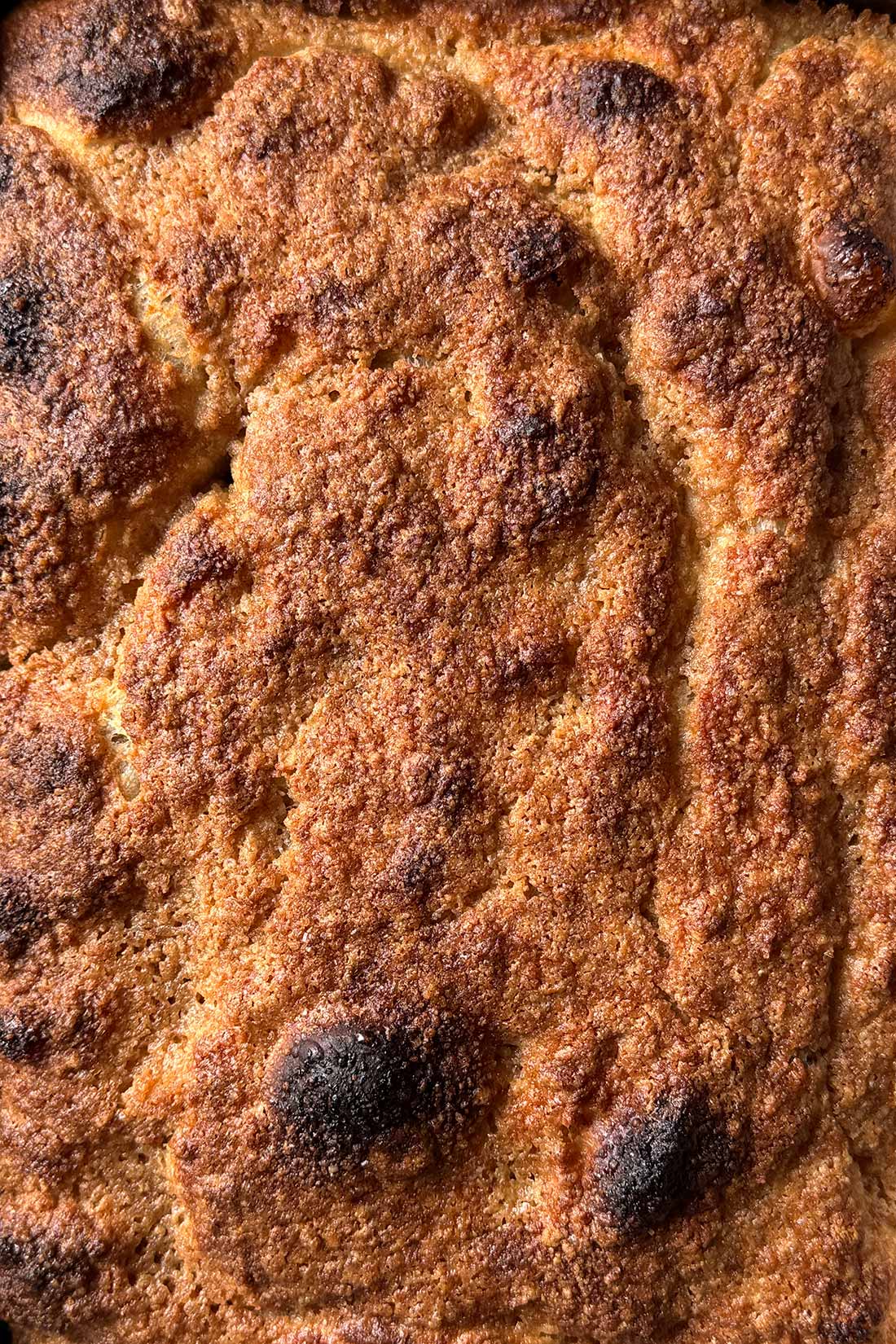 crumb topped cinnamon focaccia fresh from the oven.