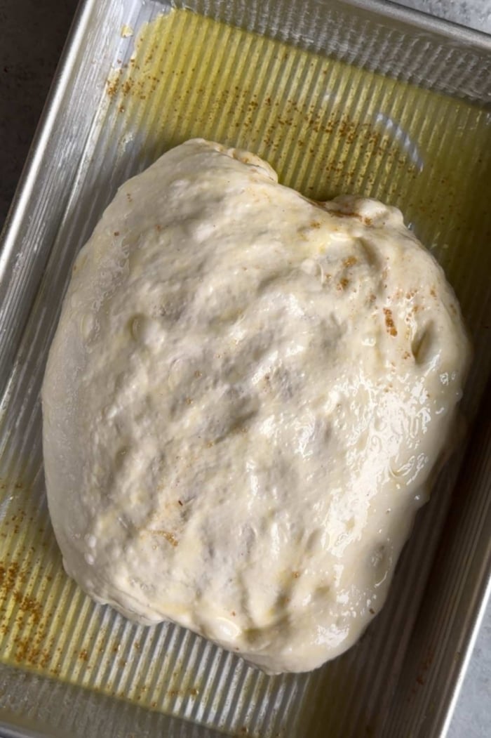 let focaccia rest until dough in size.
