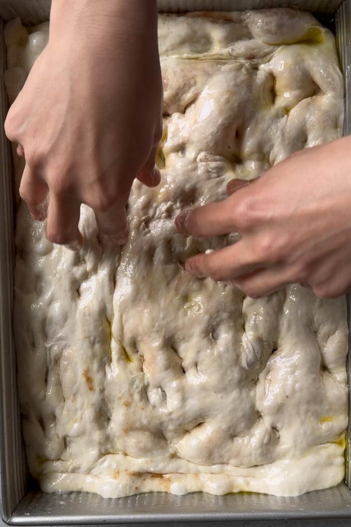 dimple surface of focaccia with your fingers. 
