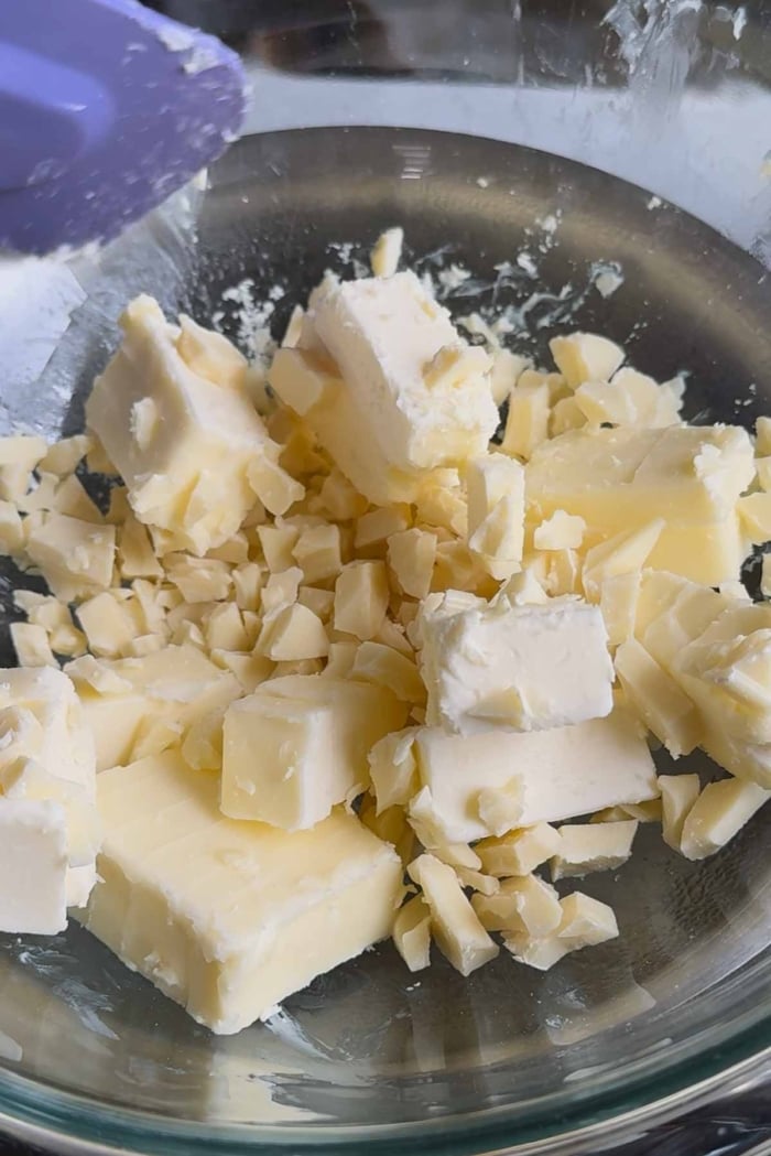 melt white chocolate and butter over bain-maire.