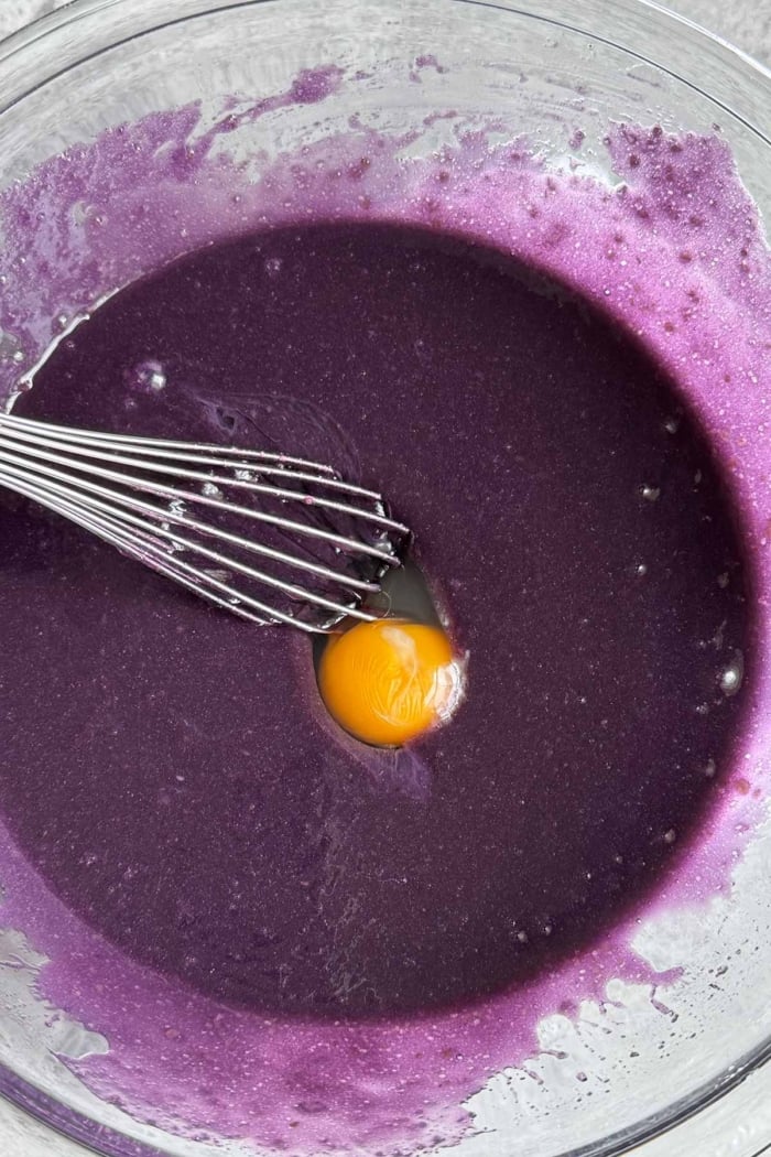 add eggs one at a time to ube brownie batter.