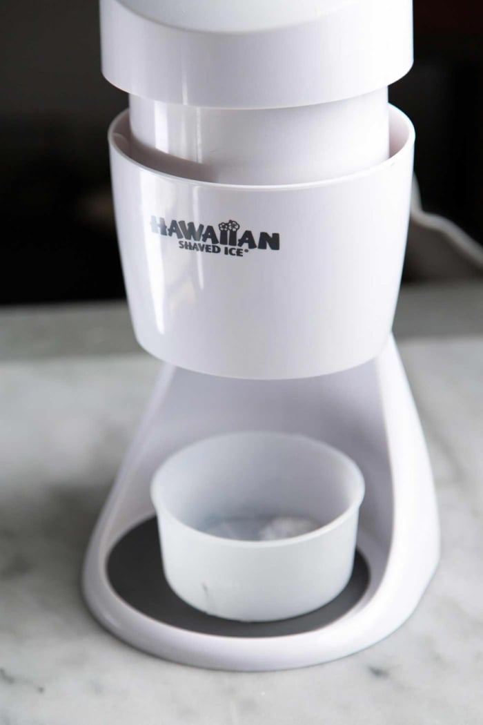 hawaiian shaved ice electric ice shaver machine in color white.