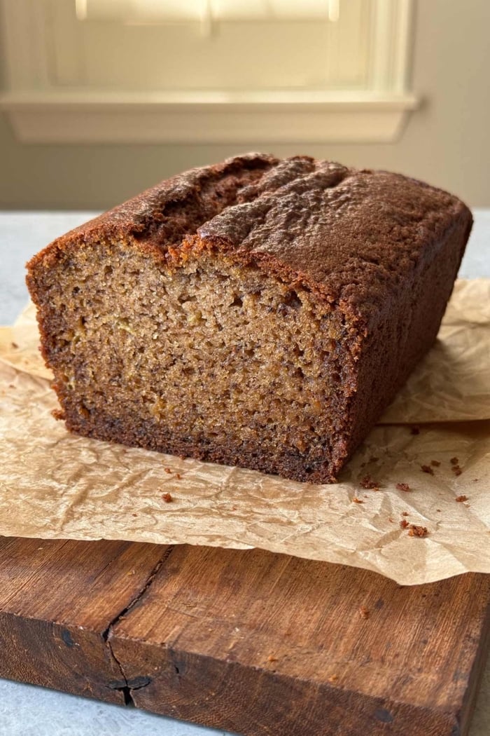 mochi banana bread on wooden board.