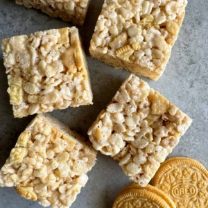 apple pie oreo folded into cinnamon brown butter rice crispy cereal treats.
