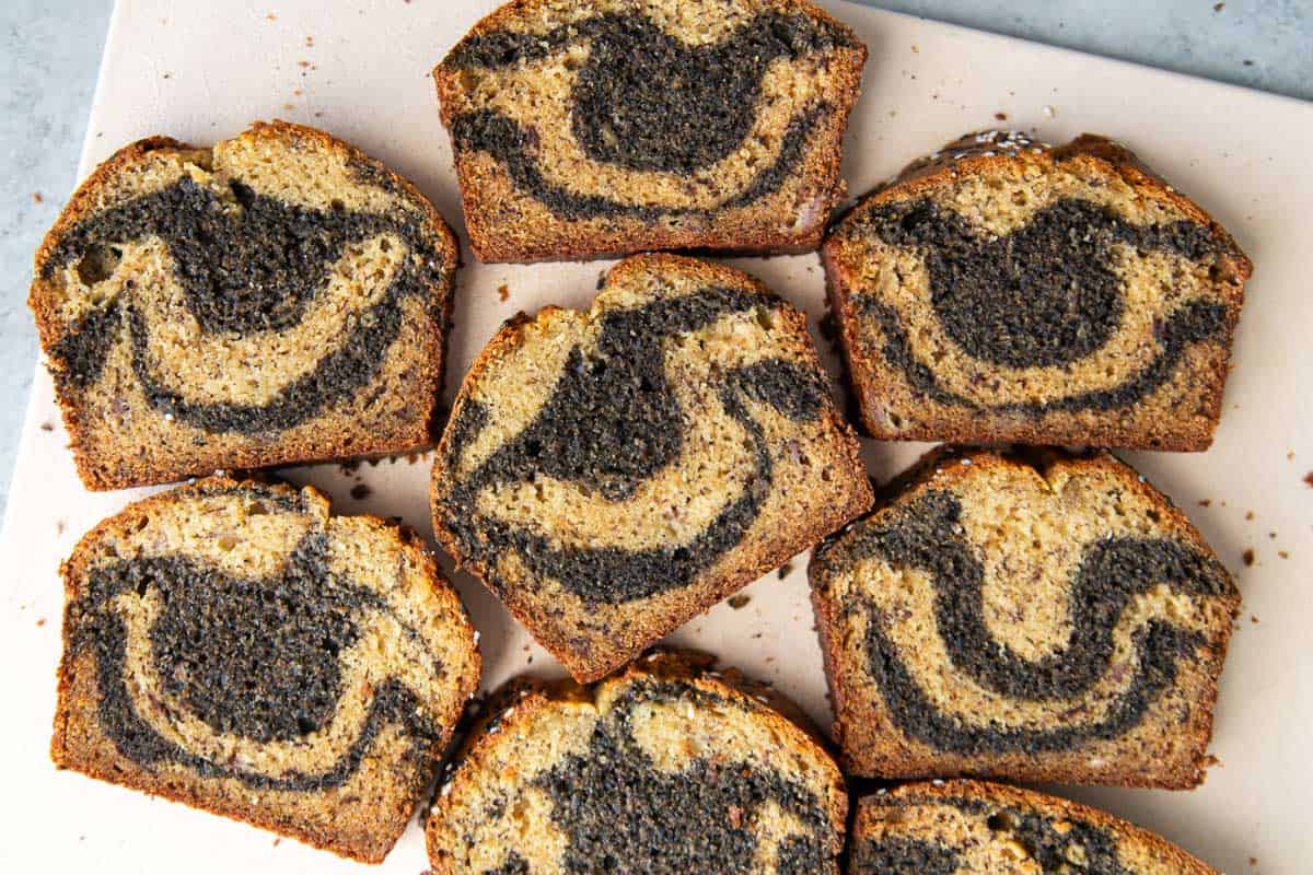 slices of black sesame banana bread on cutting board.