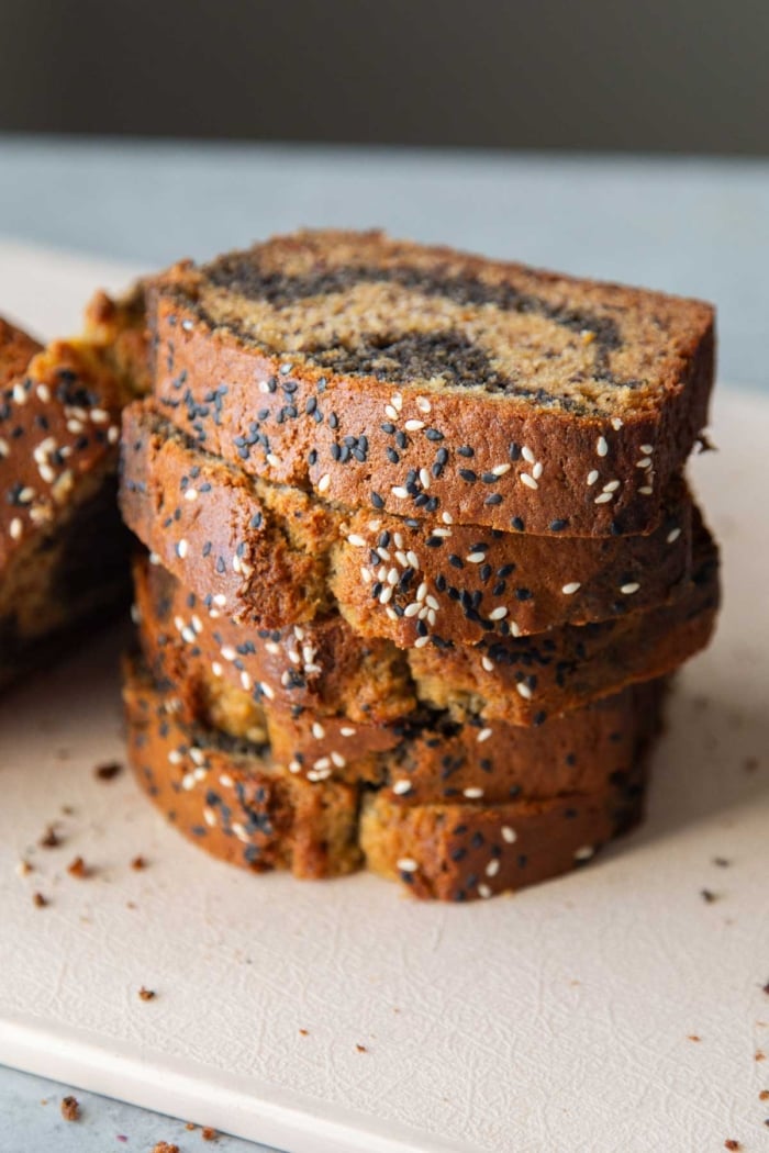 slices of black sesame banana bread stacked.