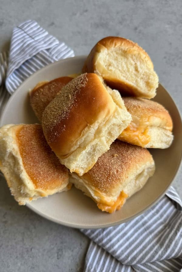 bowl of fresh baked cheese pandesal.