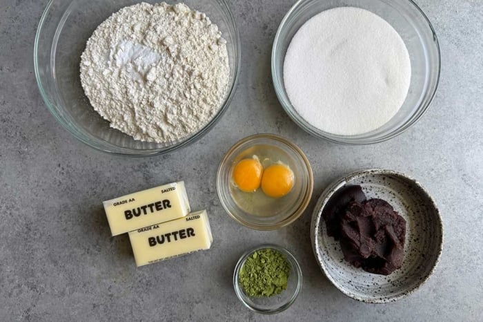 portioned ingredients to make red bean stuffed matcha sugar cookies.