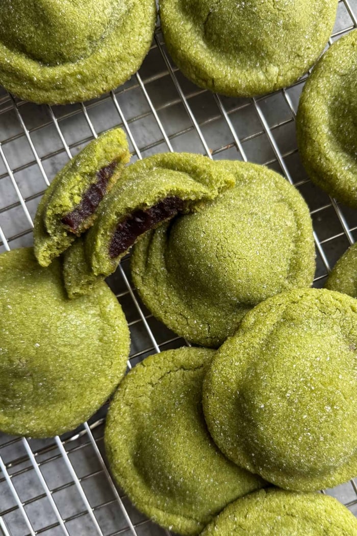 matcha red bean stuffed cookies on wire rack.