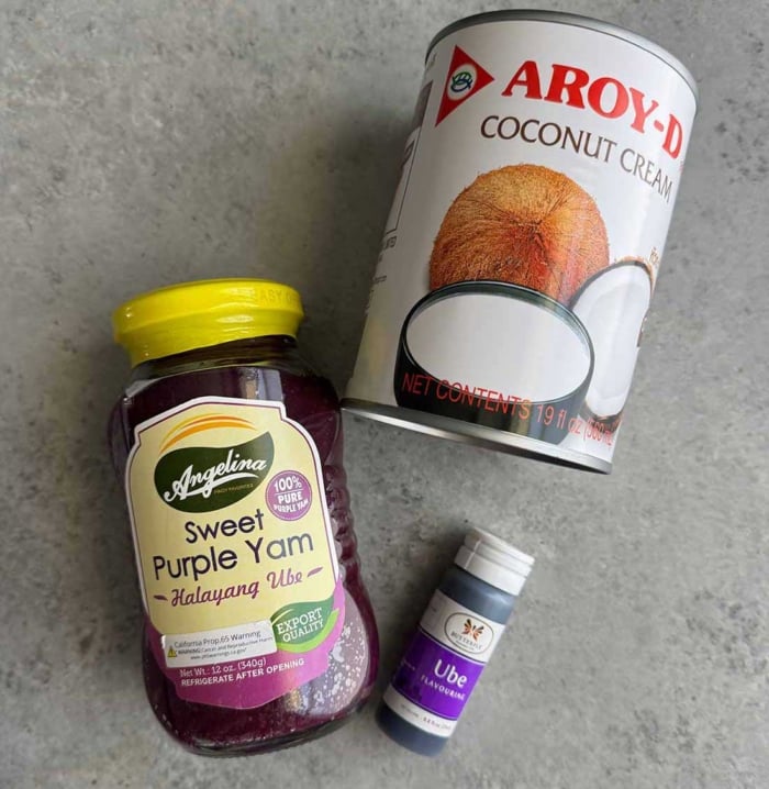 coconut cream can, jar of ube halaya, and bottle of ube extract.