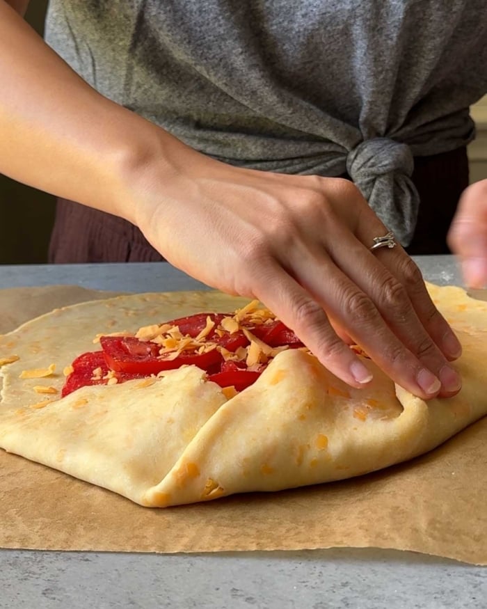 fold dough edges over filling.
