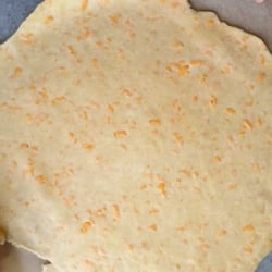 rolled out all butter cheddar pie dough.
