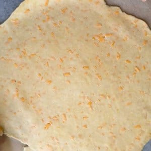 rolled out all butter cheddar pie dough.