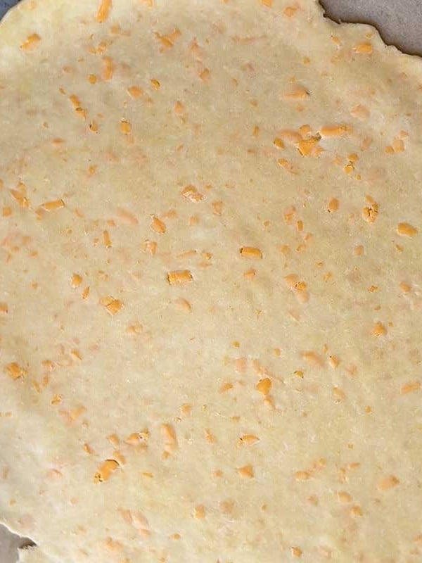 rolled out all butter cheddar pie dough.