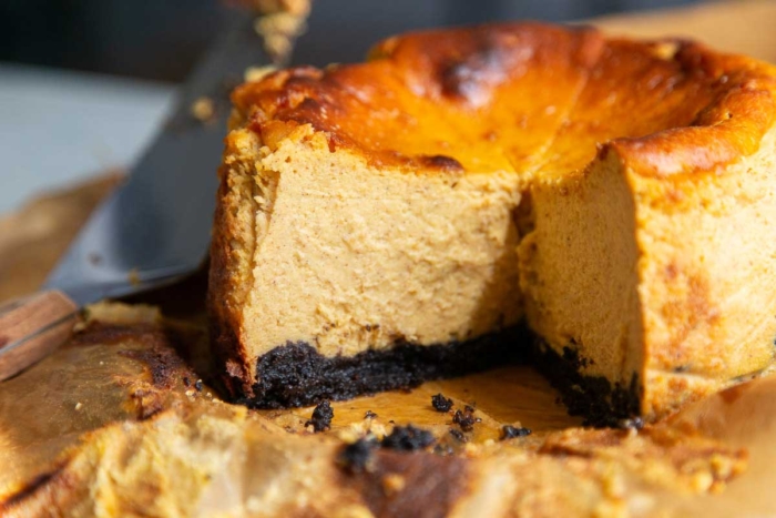 interior shot Basque style cheesecake with crust.